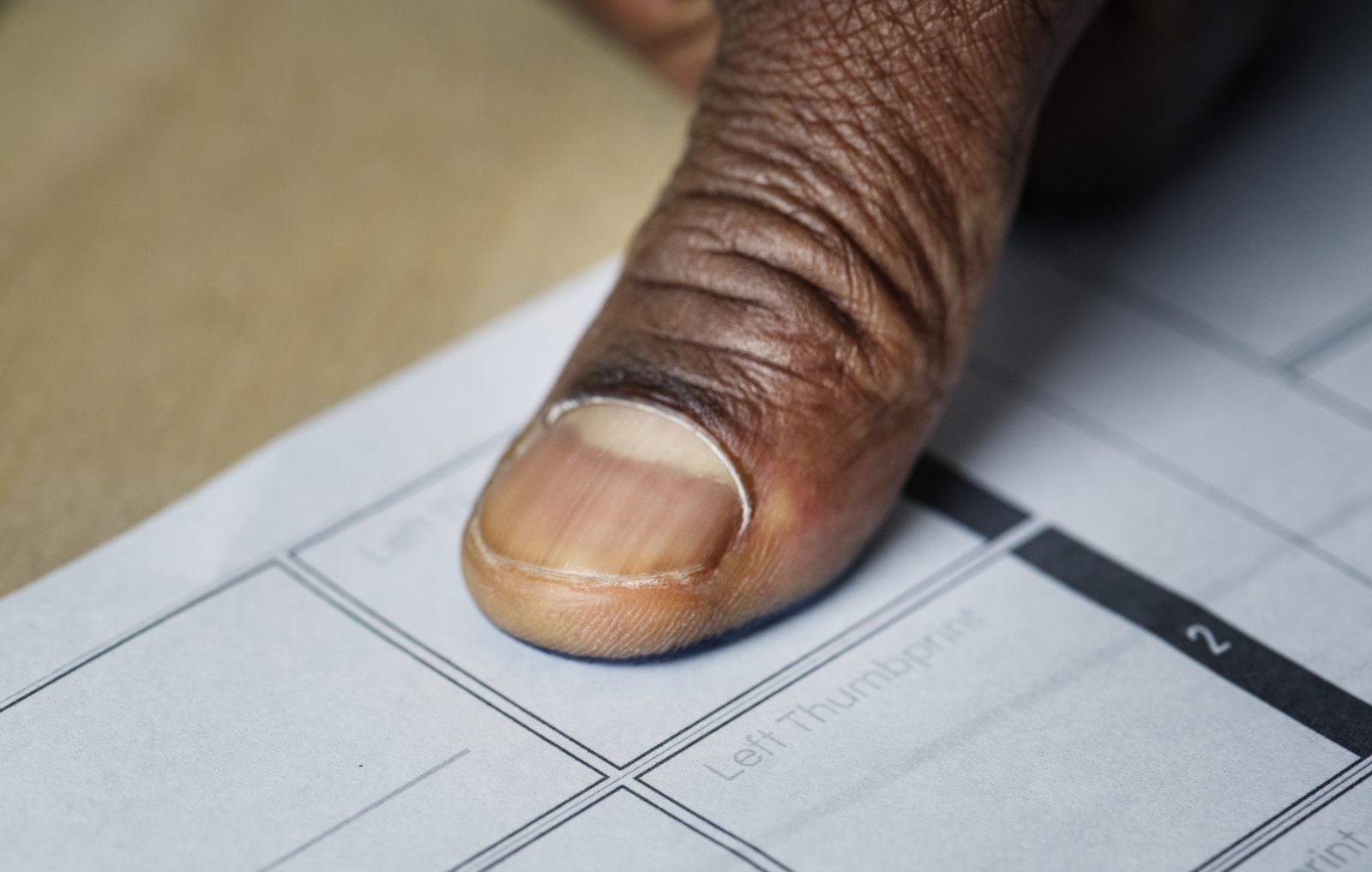 Fingerprint on paper, the start of a South African police clearance application
